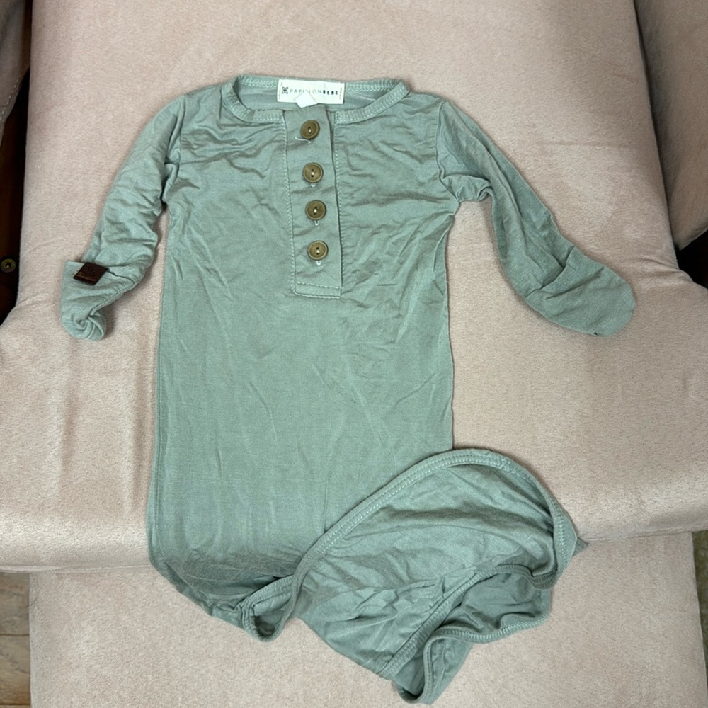 Baby sleeper gown that ties